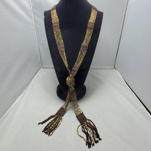 Mystique Boutique brown gold beaded tie knot necklace